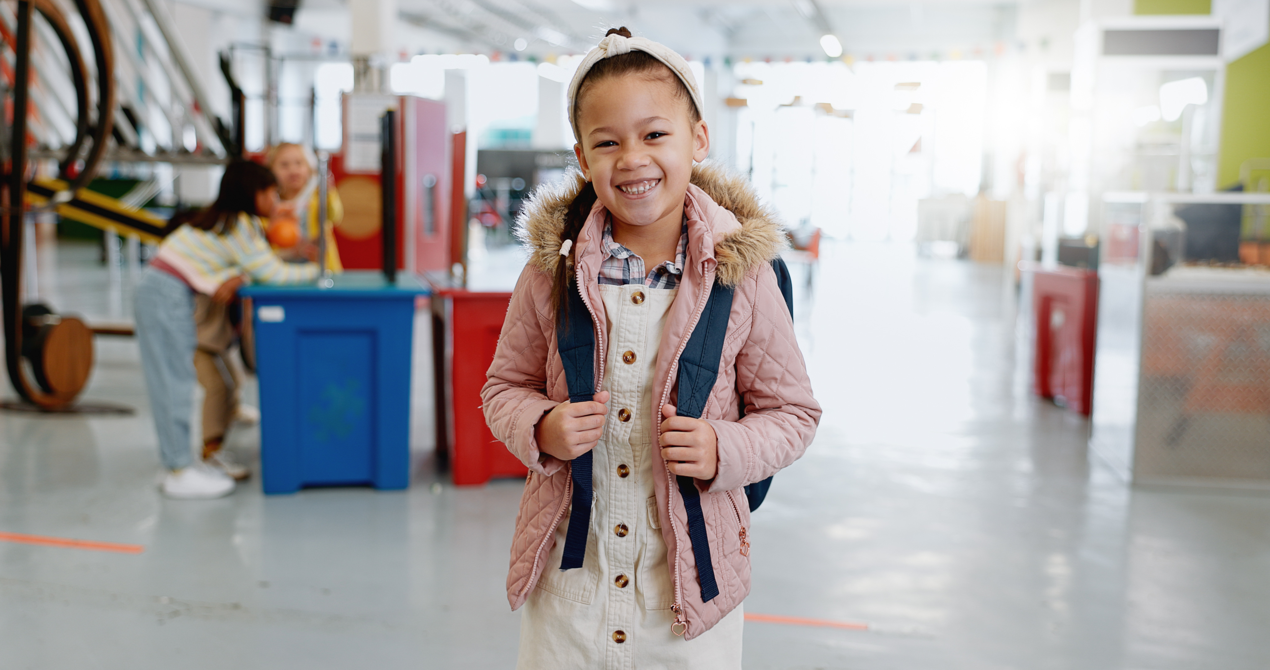 Young, child and museum with happy portrait for education, kindergarten and kid learning with toys.